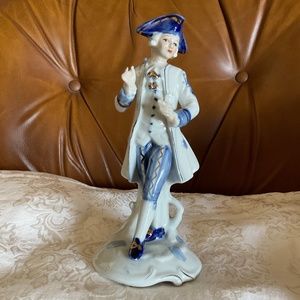 Vintage ceramic figurine, Mid century man statute. Decorated with white, blue
